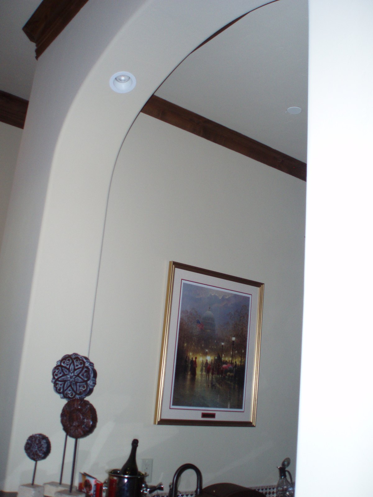 Plain wall with an arched opening above, before the bar was built